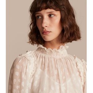 Anthropologie Ivory Ruffled High-Neck Sheer Blouse with light pink tank under it